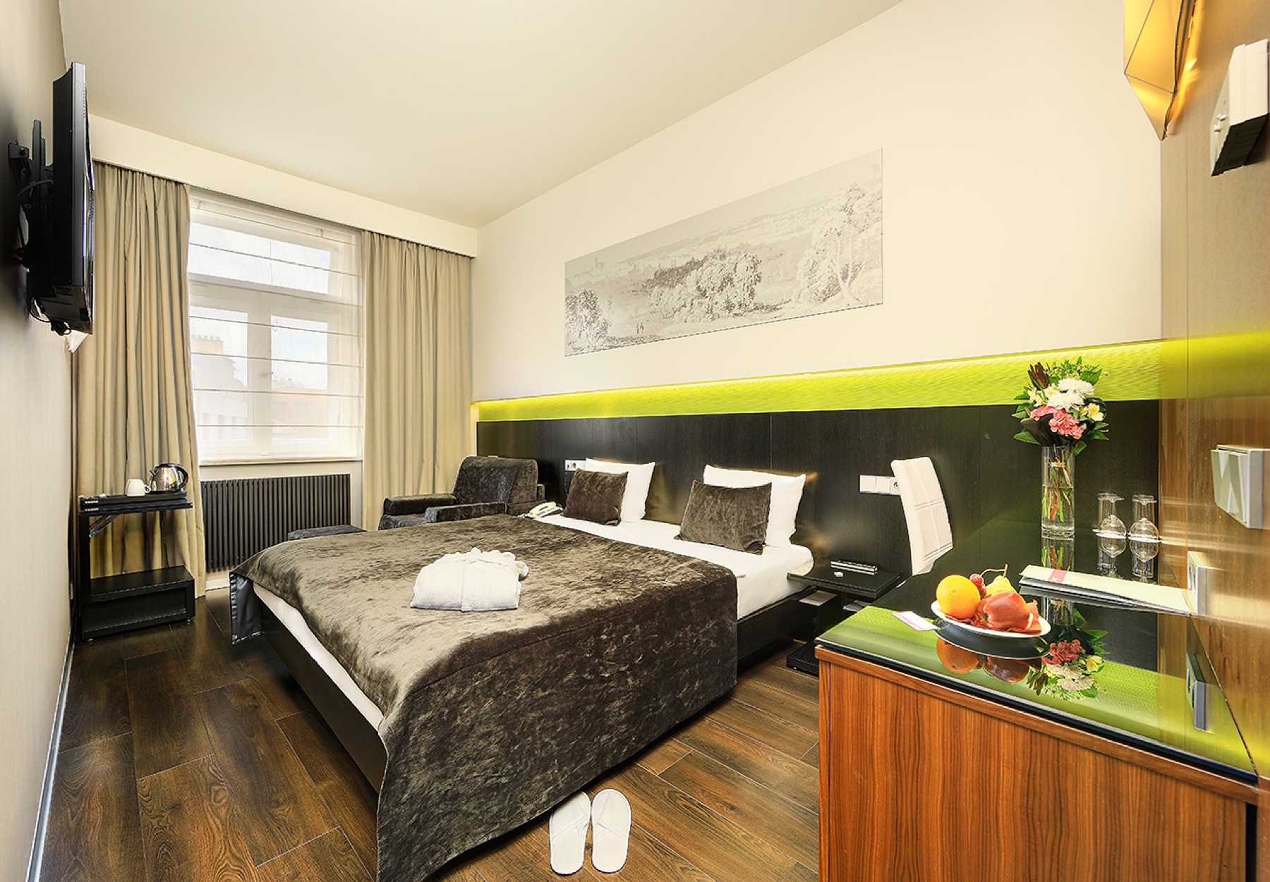 Hotel Ametyst Prague Deluxe room with optional fold-out armchair extra bed in dark style