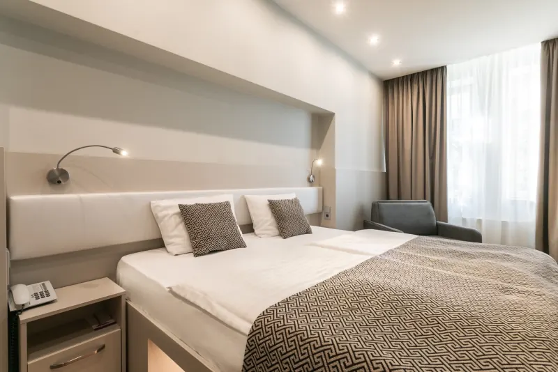 Hotel Ametyst Prague light Deluxe room with optional fold-out armchair extra bed