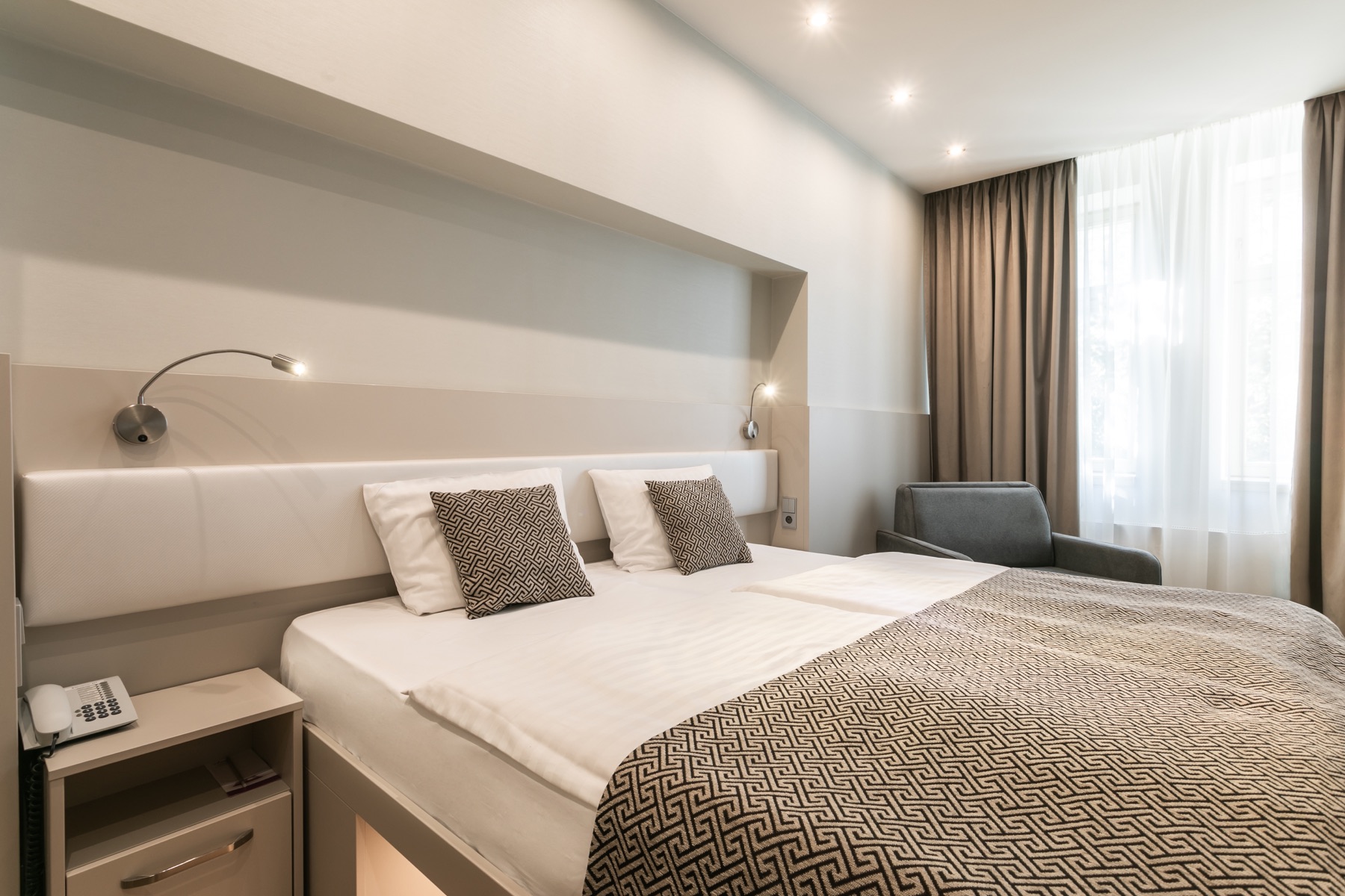 Hotel Ametyst Prague light Deluxe room with optional fold-out armchair extra bed