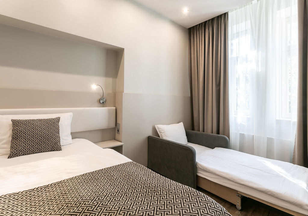 Hotel Ametyst Prague Deluxe room with optional fold-out armchair extra bed